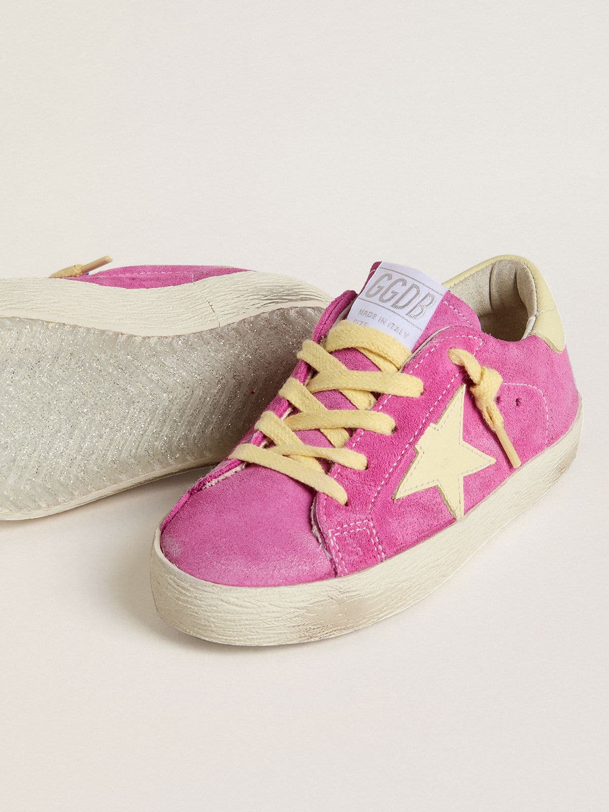 Golden Goose Junior Super-Star in pink suede with light yellow star and heel tab