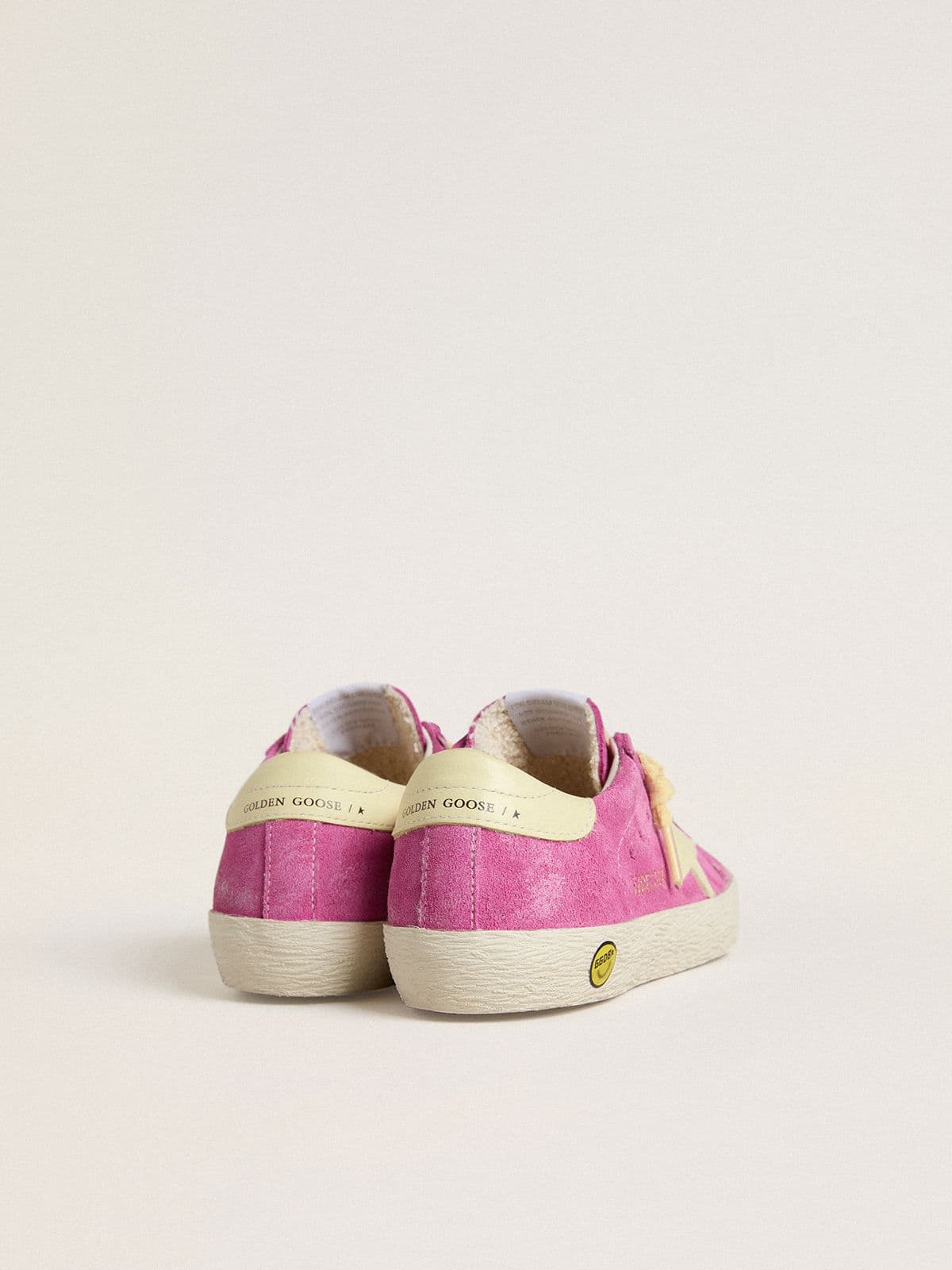 Golden Goose Junior Super-Star in pink suede with light yellow star and heel tab