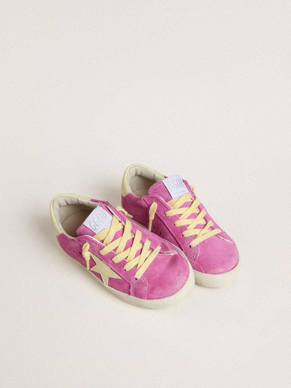 Golden Goose Young Super-Star in pink suede with light yellow star and heel tab