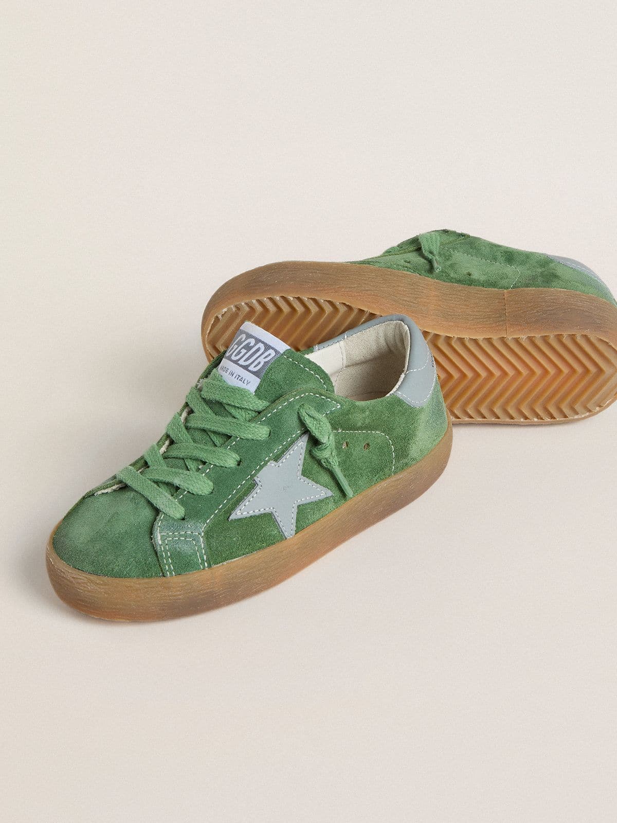 Golden Goose Junior Super-Star in green suede with baby blue star and heel tab