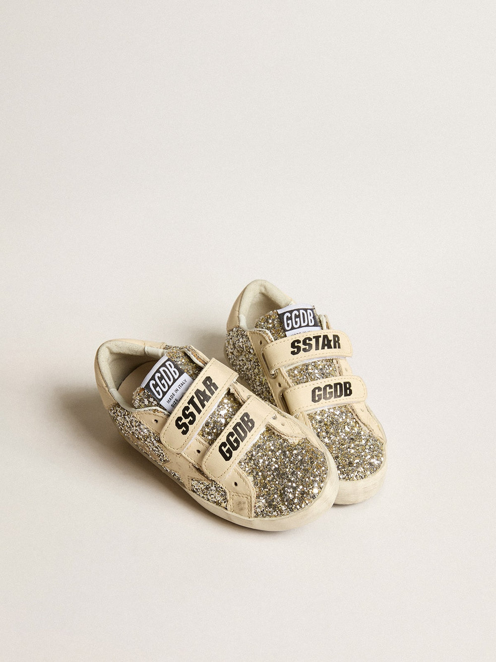 Golden Goose Old School Young in platinum glitter with leather star and heel tab