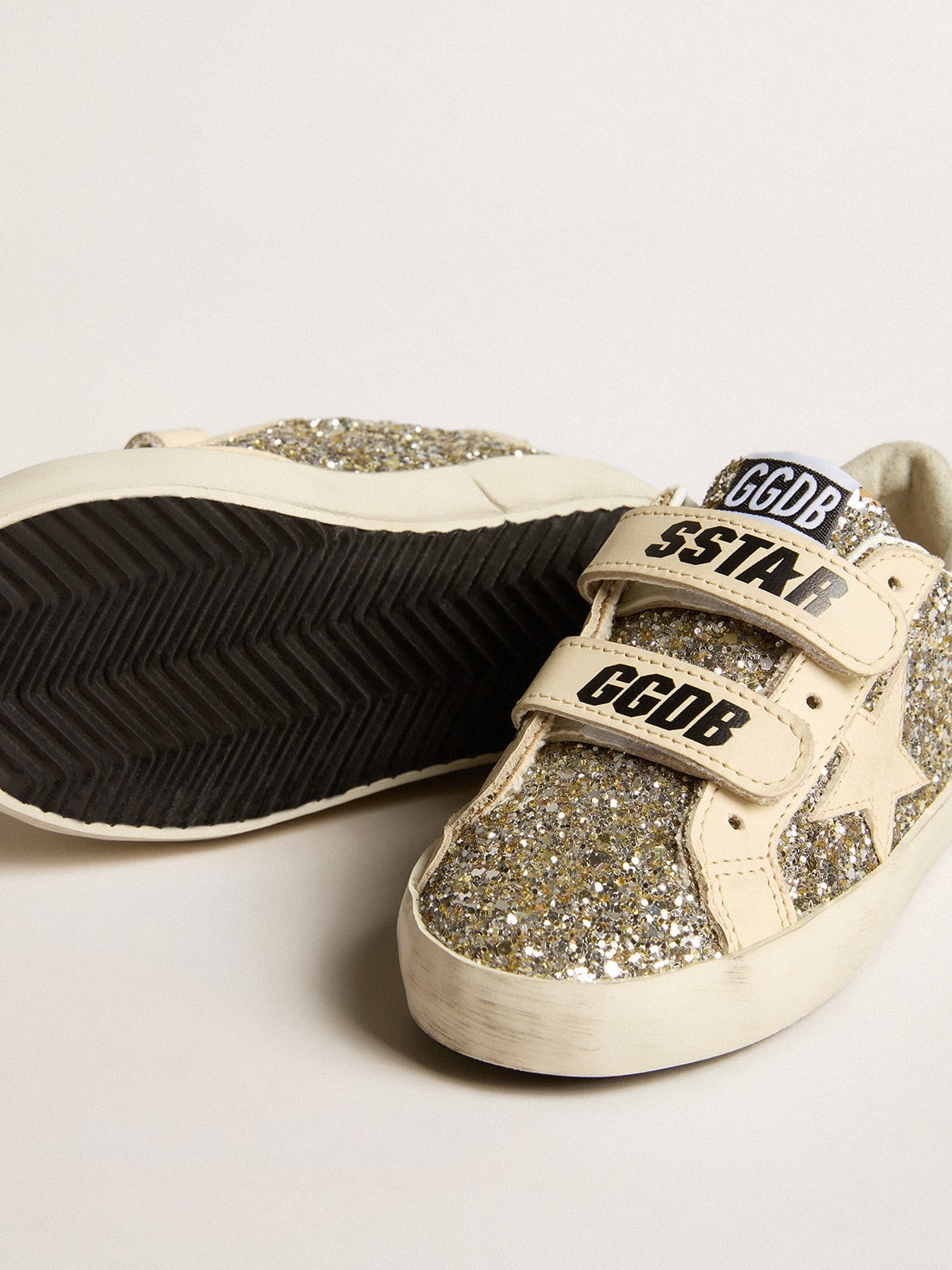 Golden Goose Old School Young in platinum glitter with leather star and heel tab