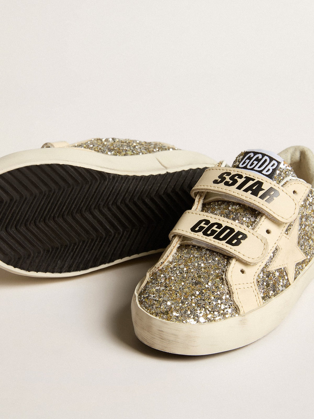 Golden Goose Old School Young in platinum glitter with leather star and heel tab