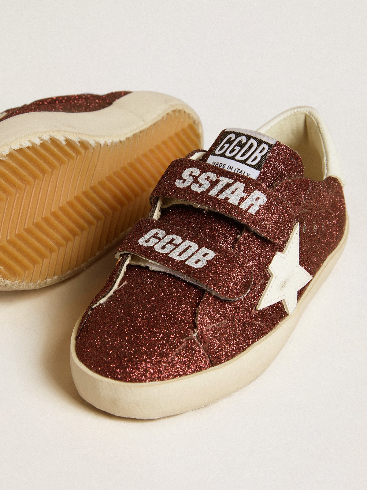 Golden Goose Old School Junior in burgundy glitter with leather star and heel tab