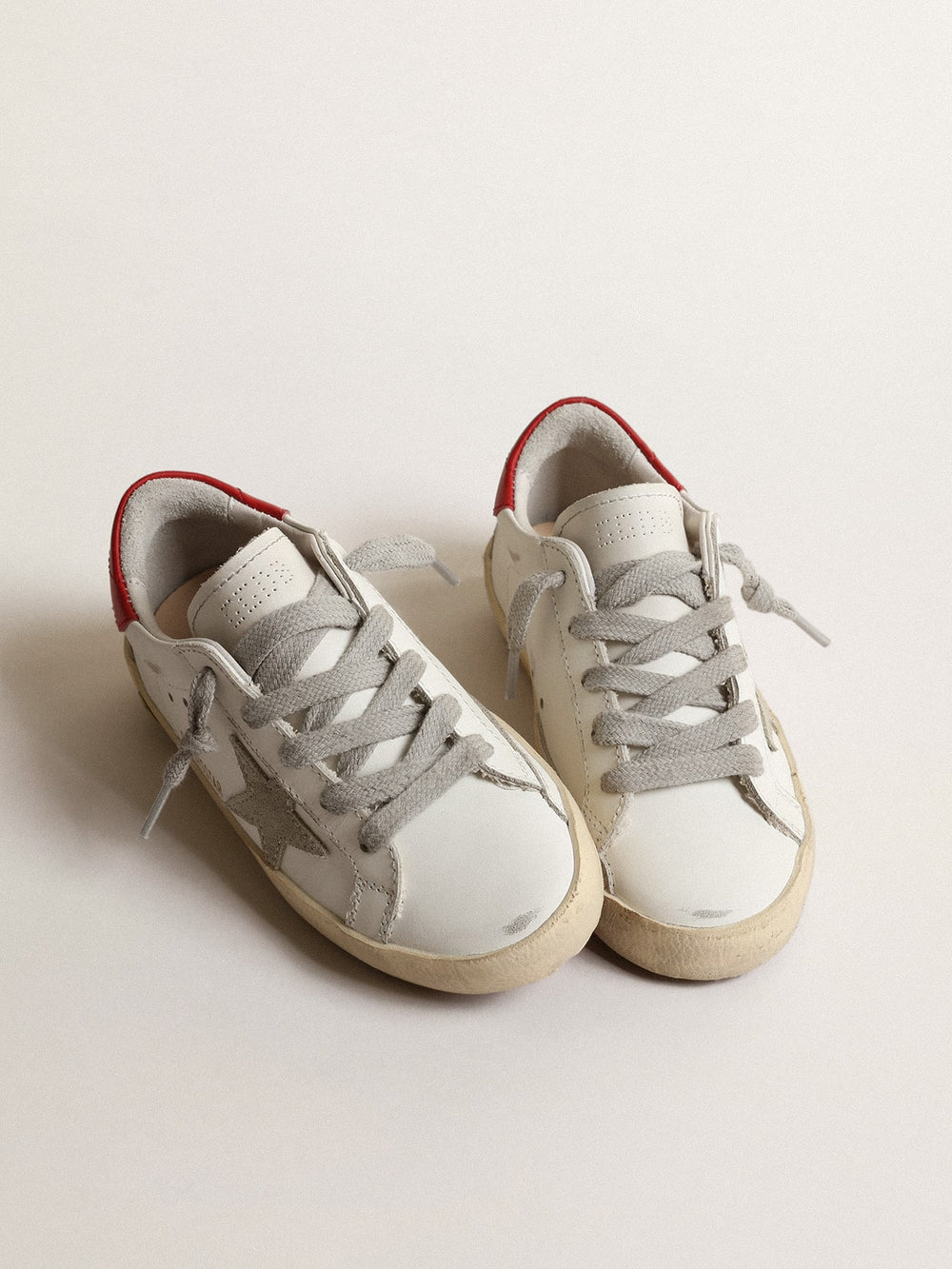 Golden Goose Super-Star Young with suede star and red leather heel tab