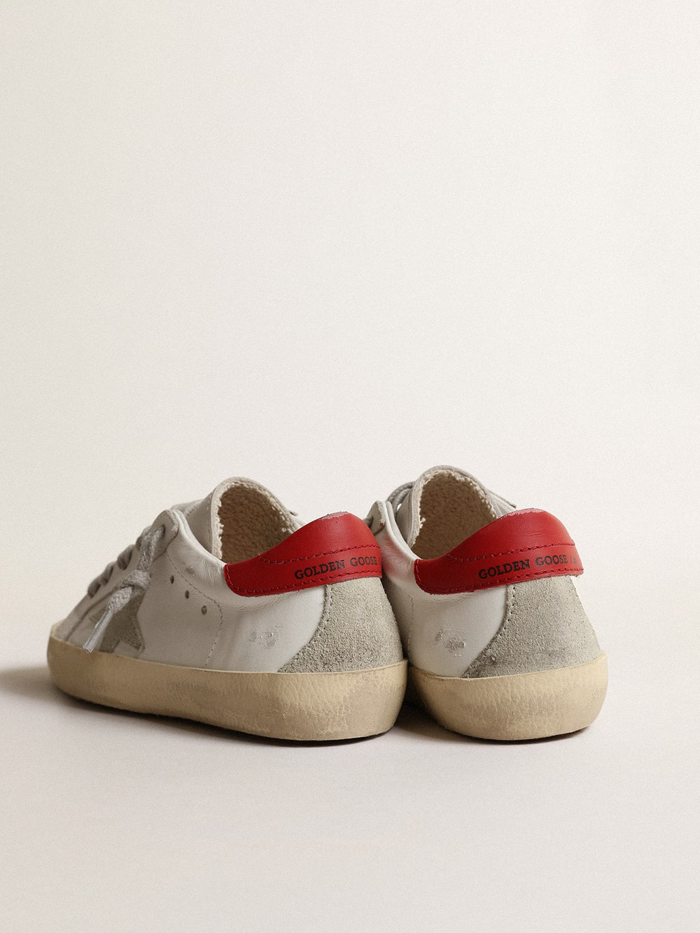 Golden Goose Super-Star Young with suede star and red leather heel tab