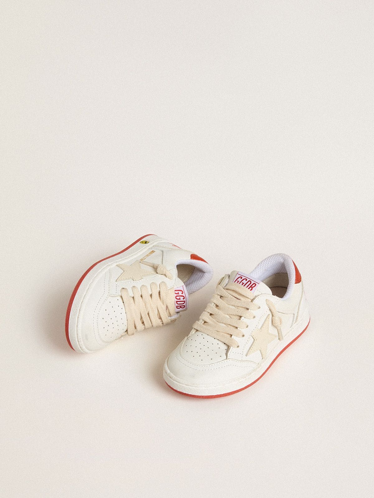 Golden Goose Young Ball Star in leather with cream-colored star and red leather heel tab