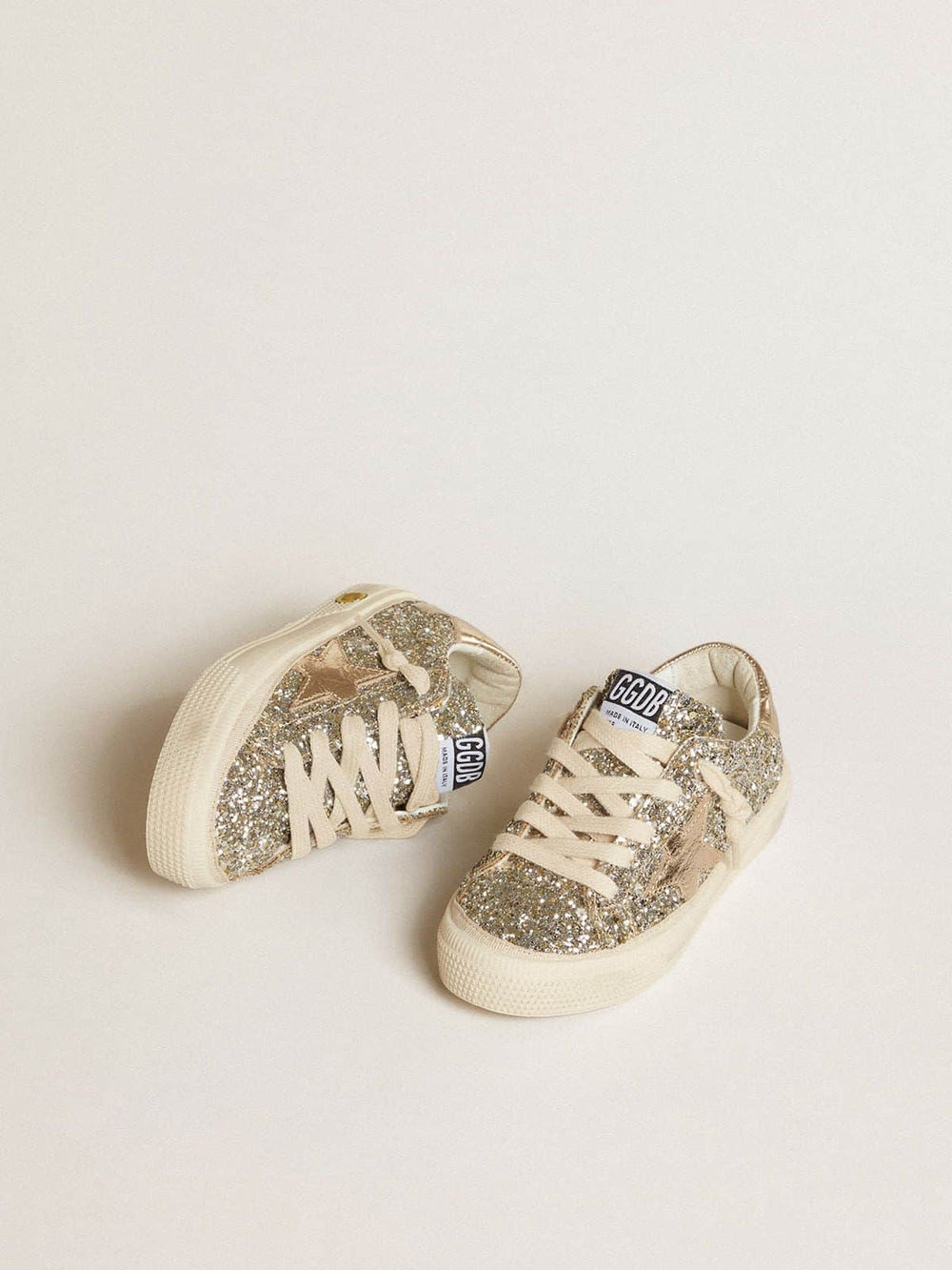 Golden Goose May Teen in platinum glitter with gold leather star and heel tab