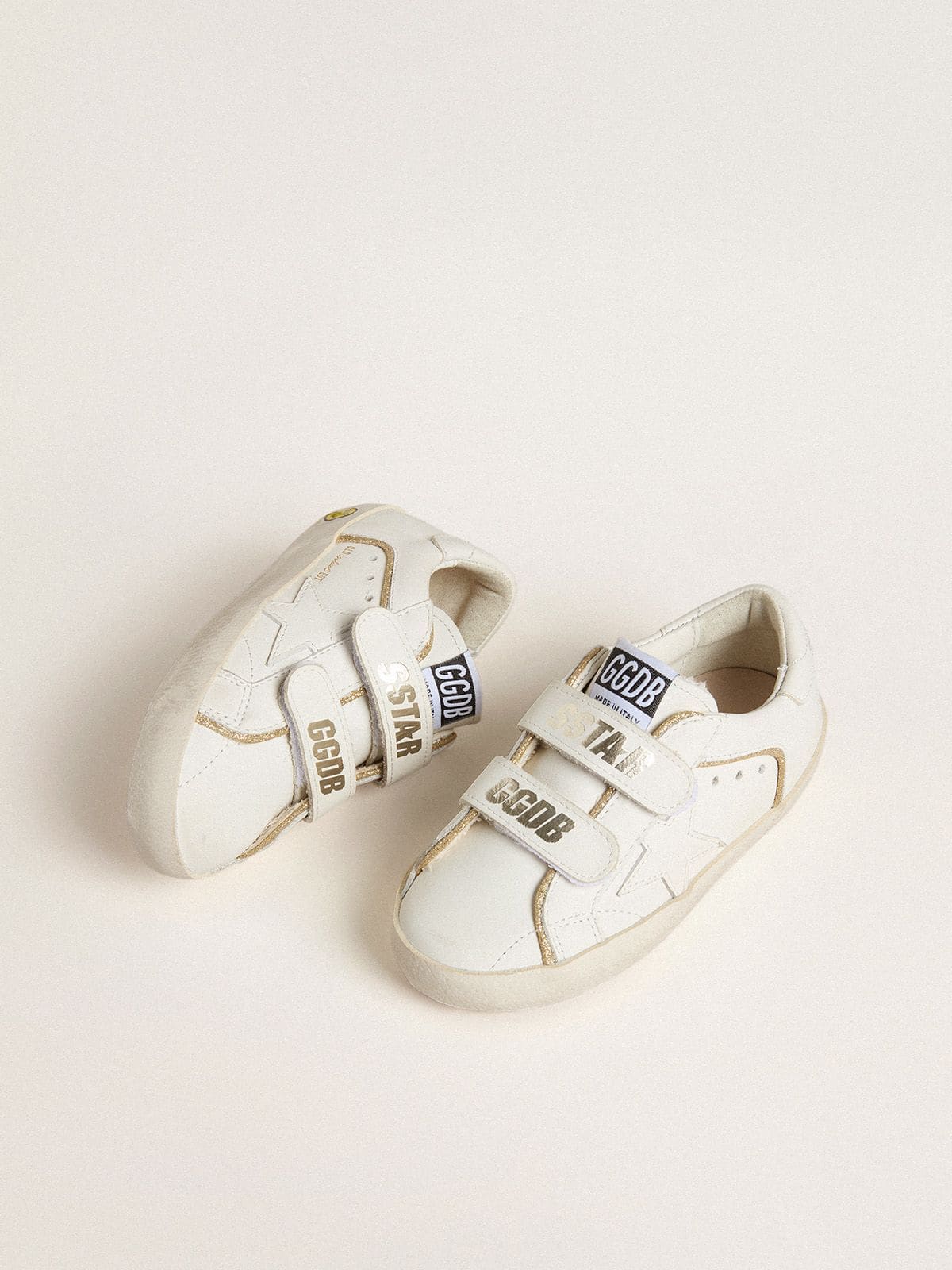 Golden Goose Young Old School in white leather with gold details