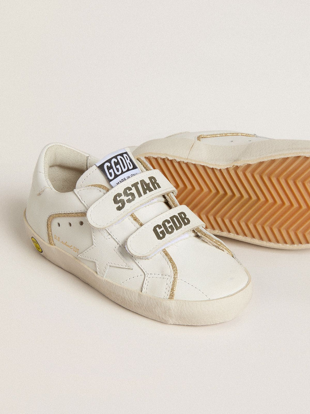 Golden Goose Young Old School in white leather with gold details