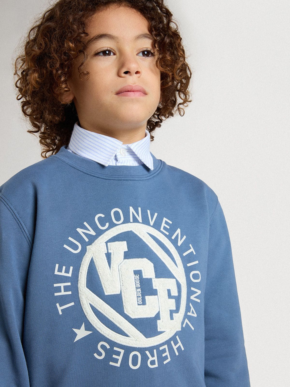 Golden Goose Kids’ blue sweatshirt with white embossed patches