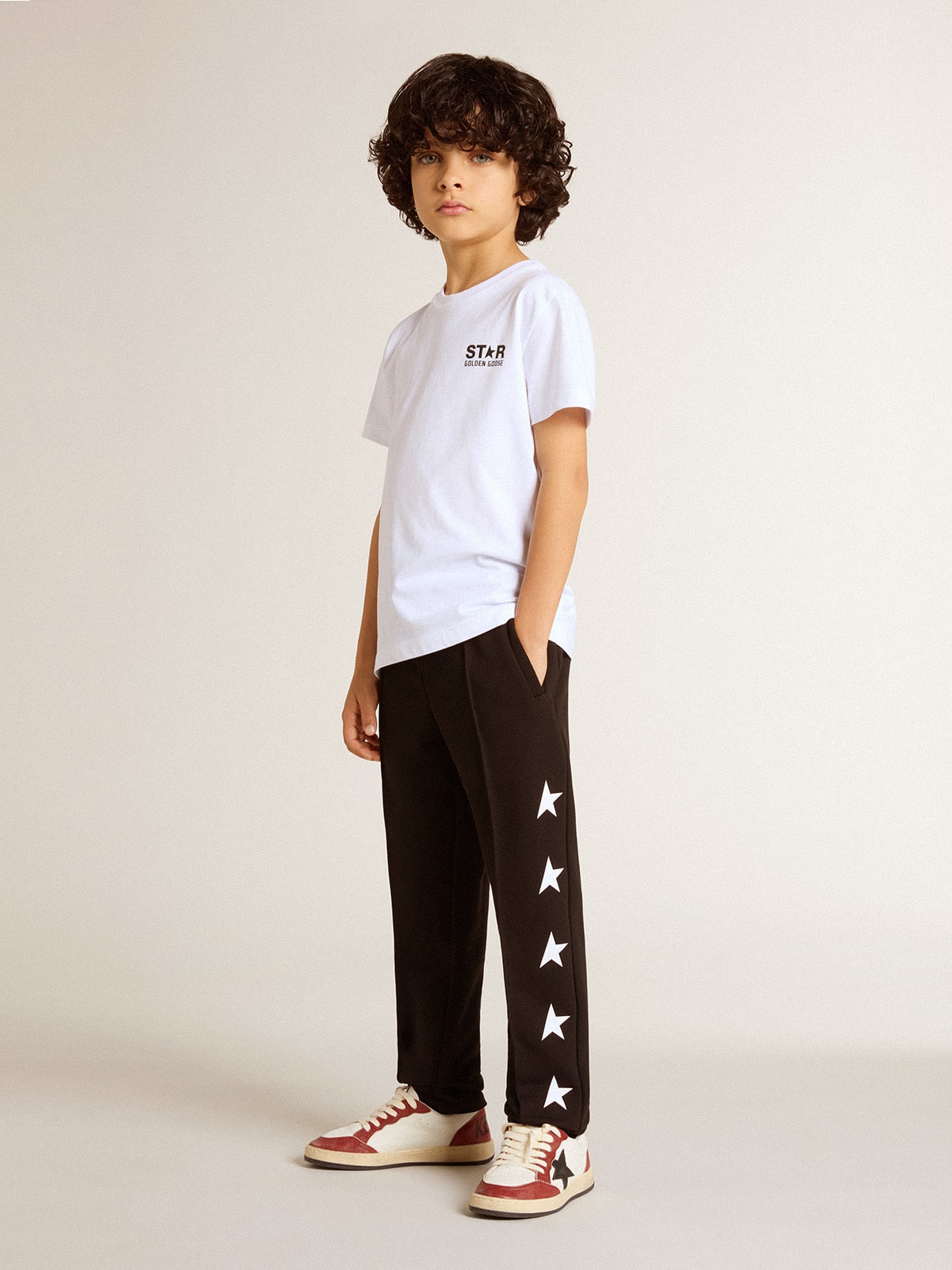Golden Goose Boys’ black joggers with white stars