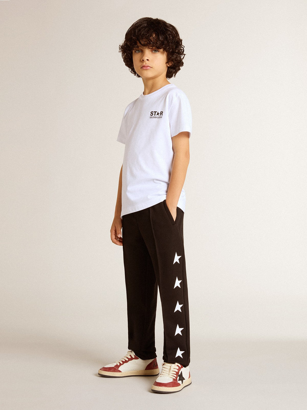 Golden Goose Boys’ black joggers with white stars