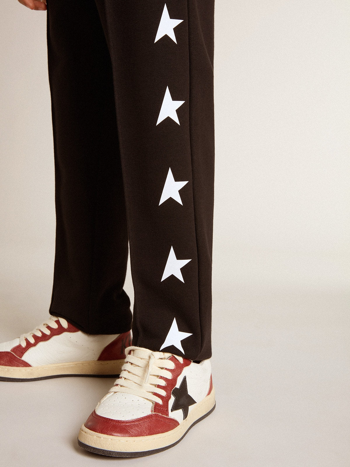 Golden Goose Boys’ black joggers with white stars