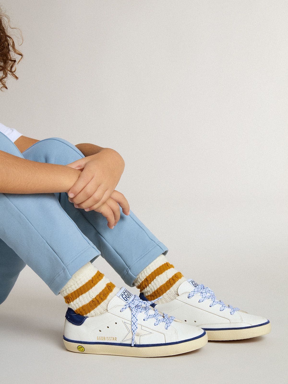 Golden Goose Junior Super-Star in white leather with blue suede heel tab