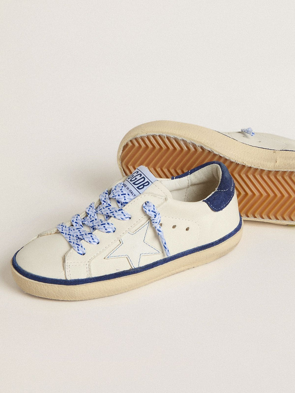 Golden Goose Junior Super-Star in white leather with blue suede heel tab