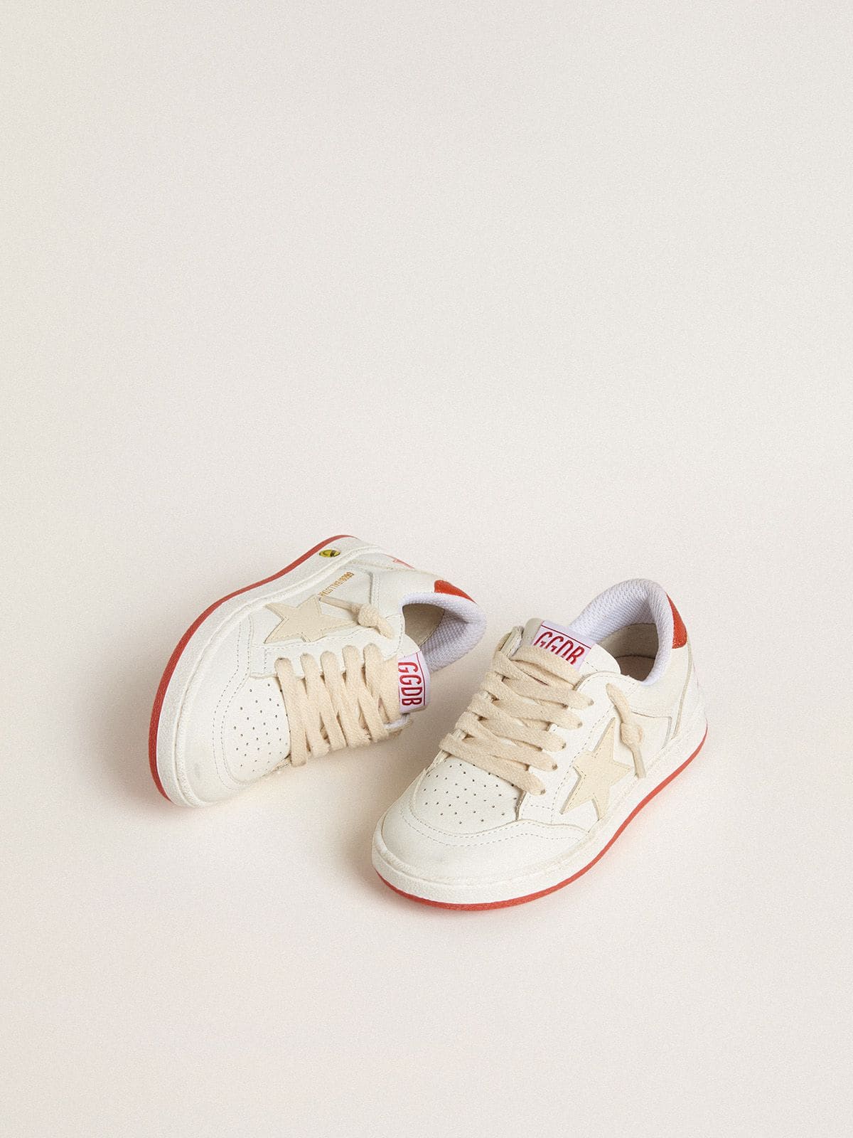 Golden Goose Junior Ball Star in leather with cream-colored star and red leather heel tab
