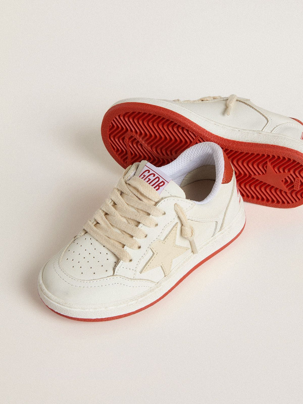 Golden Goose Junior Ball Star in leather with cream-colored star and red leather heel tab