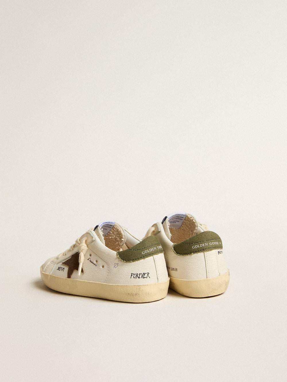 Golden Goose Super-Star Junior in nappa with suede star and green heel tab