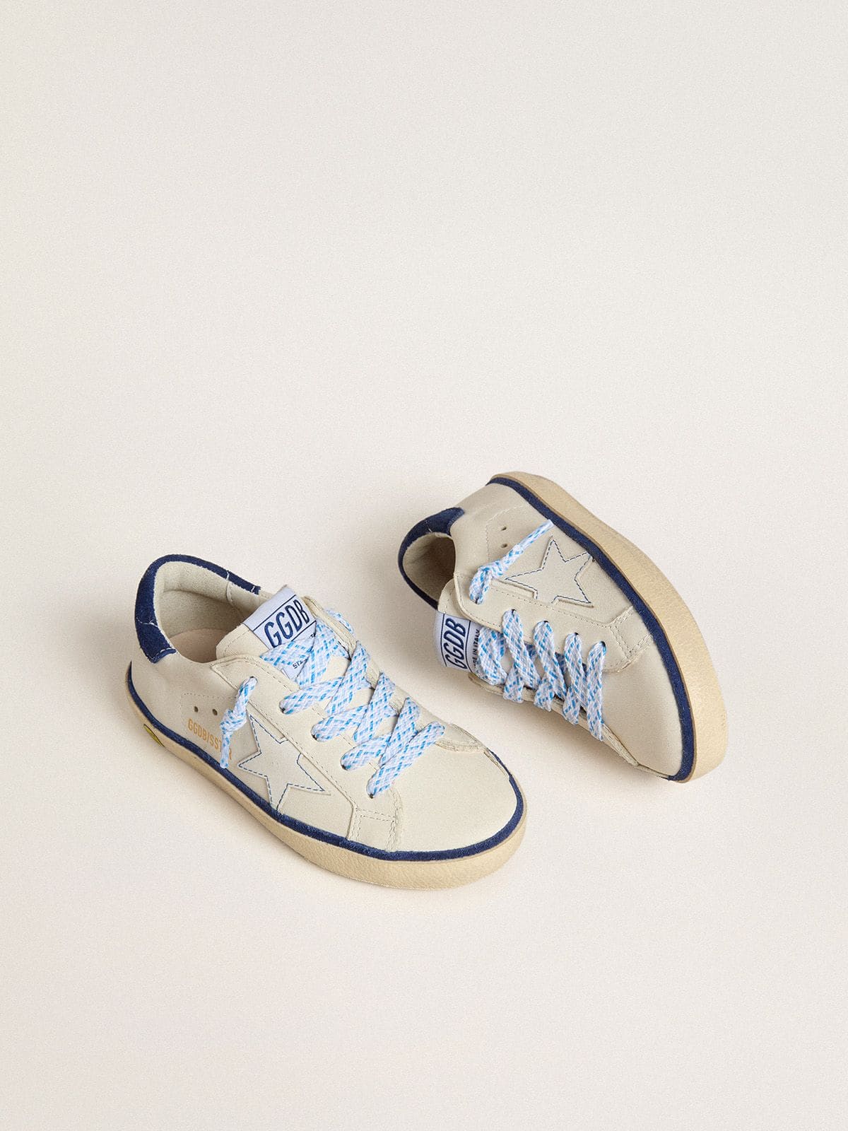 Golden Goose Young Super-Star in white leather with blue suede heel tab