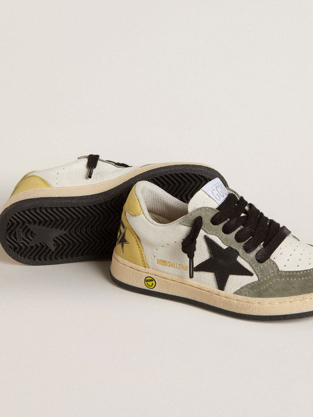 Golden Goose Ball Star Young in white nappa with dark green suede inserts and black star